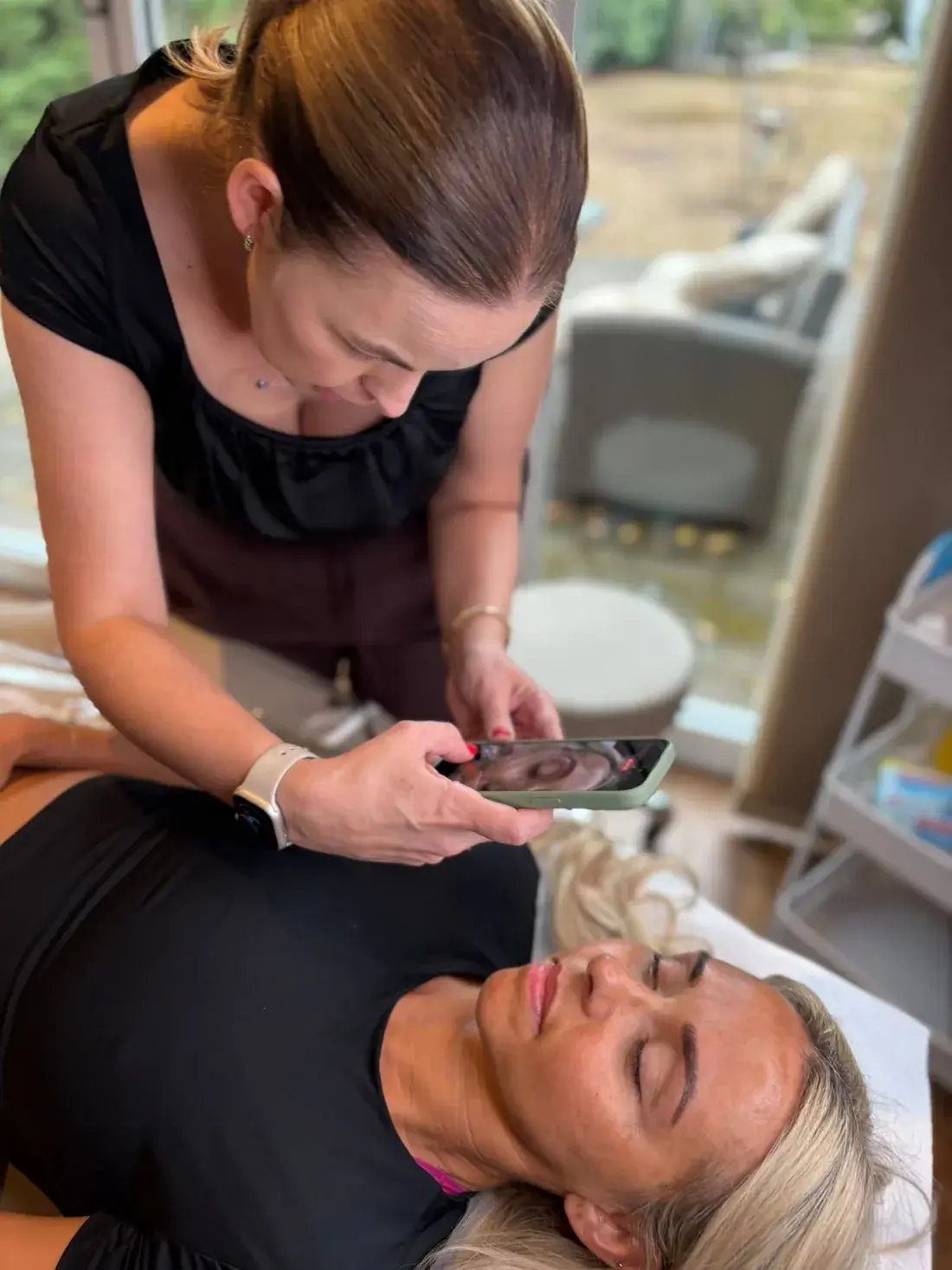 Jasmine training a student one-to-one in the Beauty Within studio